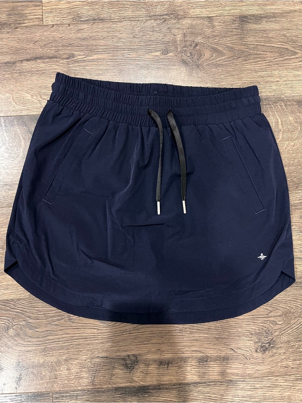 HALARA High Waisted Drawstring Pocket 2-in-1 Curved Hem Mini Golf Skirt